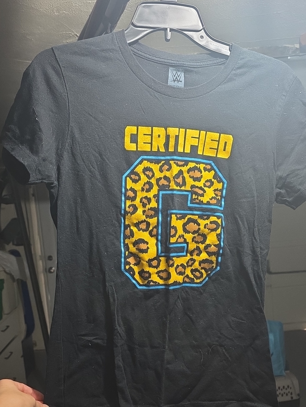 WWE Black Tee with Yellow Leopard 'G' and Blue Outline